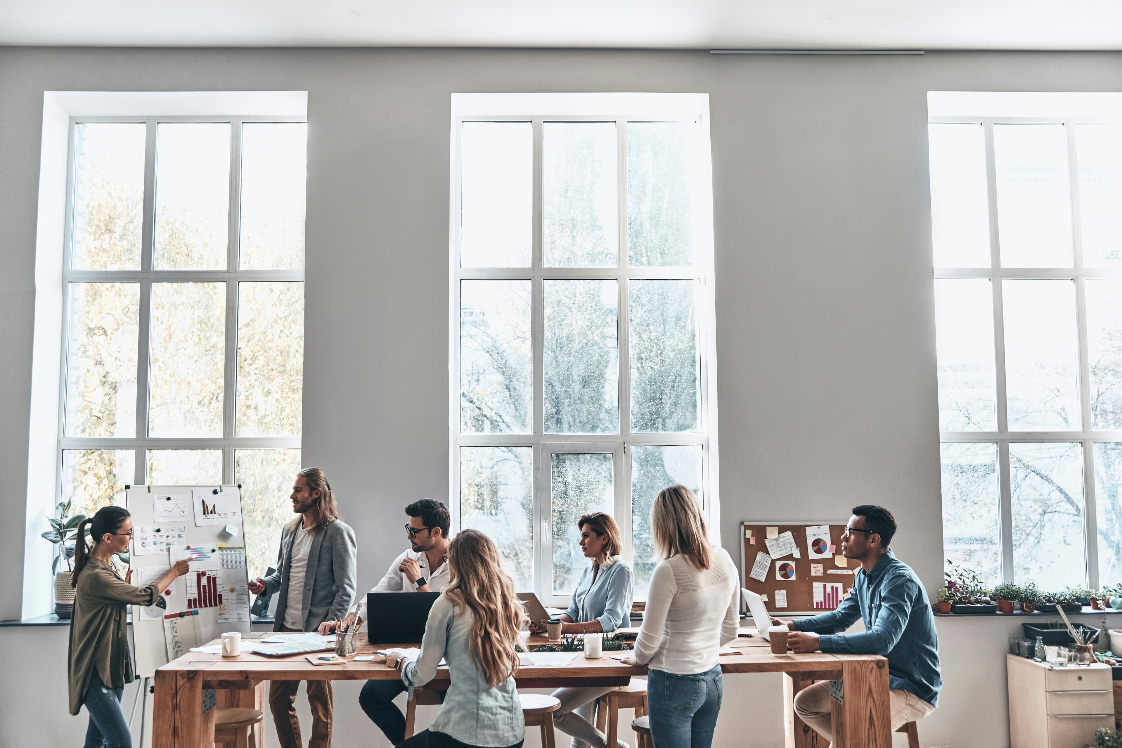 IOX team collaborating in a modern meeting room